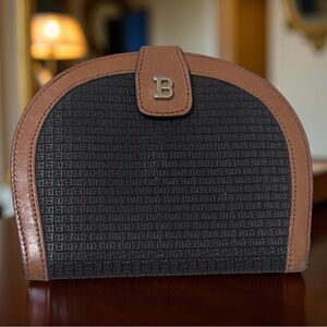 Bally black and brown wallet with a "B" logo motif. Embossed B's Dome leather